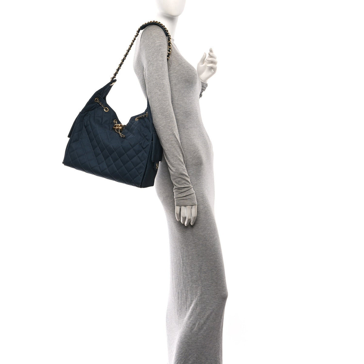 Canvas Quilted Medium Chanel 25 Handbag Dark Blue